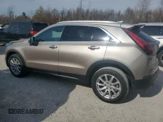 2022 Cadillac XT4 FWD Luxury with VIN 1GYAZAR4XNF121008, listed as a Copart auction lot 77599974 with 29,141 mi miles and Salvage title. Bid and sale history available at DreamBid. Image 2.
