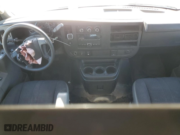 2019 GMC Savana Cargo z VIN 1GTW7AFG9K1256506, wystawiony jako Copart lot #83844804 z przebiegiem 93 502 mil mil oraz Szkody całkowita. Historia ofert i sprzedaży dostępna na DreamBid. Obrazek 8.