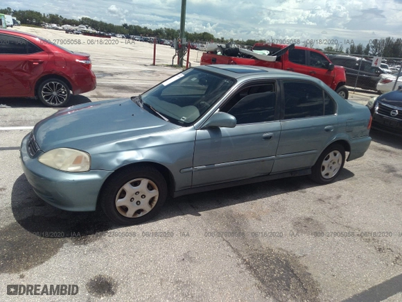 1999 Honda Civic EX with VIN 1HGEJ8643XL021026, listed as a IAAI auction lot 41686947 with 181,103 mi miles. Bid and sale history available at carsss.com. Image 2.