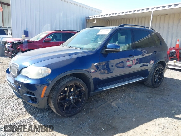2012 BMW X5 50i with VIN 5UXZV8C57CL423223, listed as a IAAI auction lot 42606594 with 94,695 mi miles and . Bid and sale history available at DreamBid. Image 2.