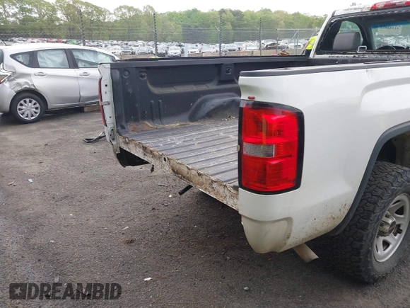 2014 GMC Sierra 1500 z VIN 1GTN1TEH0EZ352369, wystawiony jako IAAI lot #41982812 z przebiegiem 142 684 mil mil oraz . Historia ofert i sprzedaży dostępna na DreamBid. Obrazek 18.