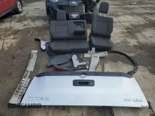 2015 Nissan Titan Pro-4X with VIN 1N6AA0EC1FN512072, listed as a Copart auction lot 85733174 with 92,460 mi miles and Salvage title. Bid and sale history available at DreamBid. Image 12.