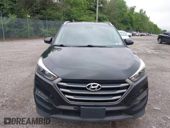 2016 Hyundai Tucson SE z VIN KM8J3CA45GU041303, wystawiony jako IAAI lot #42463591 z przebiegiem 96 516 mil mil oraz . Historia ofert i sprzedaży dostępna na DreamBid. Obrazek 13.