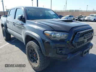 2019 Toyota Tacoma SR with VIN 5TFCZ5AN8KX205408, listed as a IAAI auction lot 41521901 with 63,387 mi miles and . Bid and sale history available at DreamBid. Image 1.