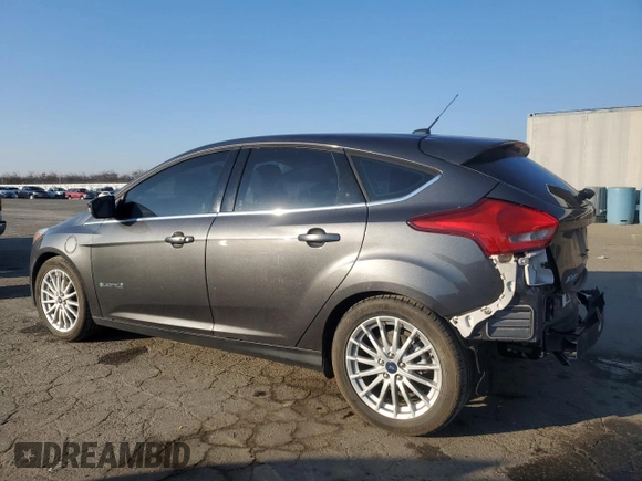 2015 Ford Focus Electric z VIN 1FADP3R44FL221828, wystawiony jako Copart lot #43067325 z przebiegiem 55 636 mil mil oraz Szkoda całkowita • Salvage title. Historia ofert i sprzedaży dostępna na DreamBid. Obrazek 2.