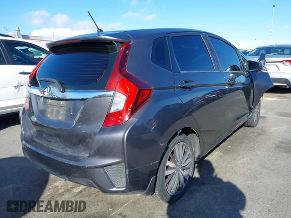 2015 Honda Fit EX-L z VIN 3HGGK5H89FM774299, wystawiony jako IAAI lot #41793448 z przebiegiem 142 228 mil mil oraz . Historia ofert i sprzedaży dostępna na DreamBid. Obrazek 4.