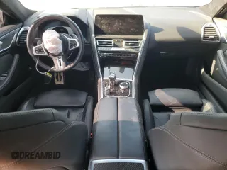 2023 BMW 8 Series M850i z VIN WBAGV8C0XPCK42813, wystawiony jako Copart lot #41823805 z przebiegiem Nie podano mil oraz Szkoda całkowita • Salvage title. Historia ofert i sprzedaży dostępna na DreamBid. Obrazek 8.