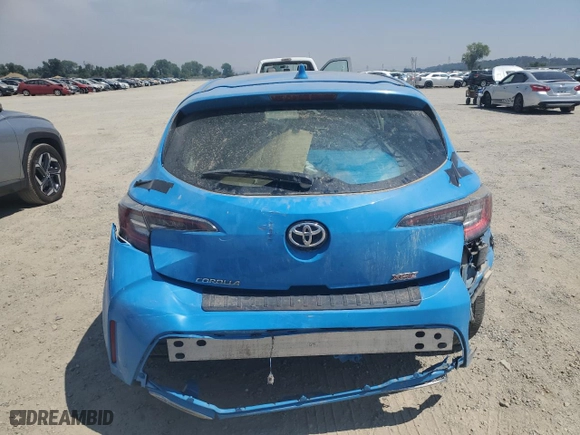2021 Toyota Corolla Hatchback XSE with VIN JTNA4MBE8M3129354, listed as a Copart auction lot 66214824 with 0 mi miles and Salvage Title. Bid and sale history available at carsss.com. Image 6.
