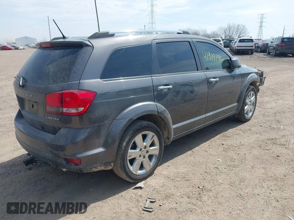 2014 Dodge Journey Limited with VIN 3C4PDDDG8ET199813, listed as a IAAI auction lot 41919196 with 199,096 mi miles and . Bid and sale history available at carsss.com. Image 4.
