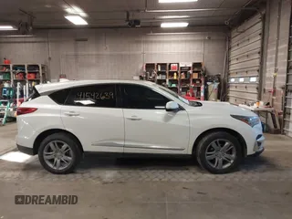 2019 Acura RDX w/Advance Pkg with VIN 5J8TC2H72KL016172, listed as a IAAI auction lot 41542639 with 105,104 mi miles. Bid and sale history available at carsss.com. Image 13.