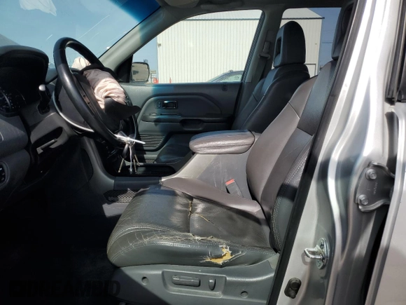 2005 Honda Pilot EX-L with VIN 5FNYF18575B061295, listed as a Copart auction lot 52235135 with 192,222 mi miles and Salvage Title. Bid and sale history available at carsss.com. Image 7.