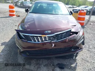 2019 Kia Optima LX z VIN 5XXGT4L38KG320364, wystawiony jako IAAI lot #42150783 z przebiegiem 103 089 mil mil oraz . Historia ofert i sprzedaży dostępna na DreamBid. Obrazek 12.