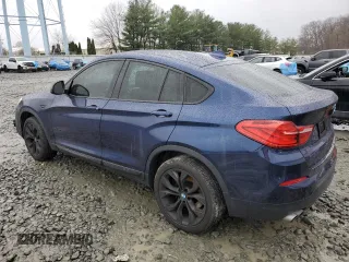 2015 BMW X4 xDrive35i with VIN 5UXXW5C50F0E88829, listed as a Copart auction lot 69464872 with 44,057 mi miles. Bid and sale history available at carsss.com. Image 2.