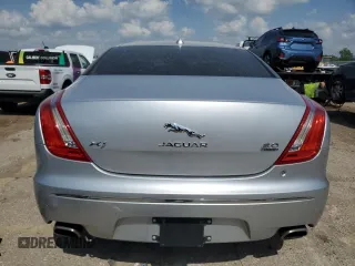 2015 Jaguar XJ with VIN SAJWJ1CD1F8V75232, listed as a Copart auction lot 57605685 with 146,314 mi miles and Salvage title. Bid and sale history available at DreamBid. Image 6.
