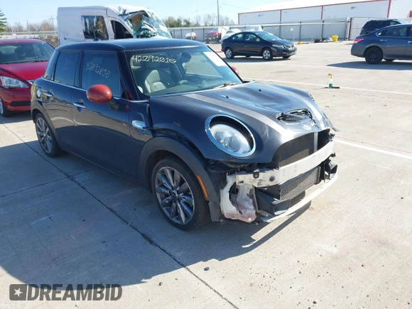 2015 MINI Hardtop 4 Door S with VIN WMWXU3C57FT892179, listed as a IAAI auction lot 42092010 with 95,156 mi miles and . Bid and sale history available at DreamBid. Image 1.