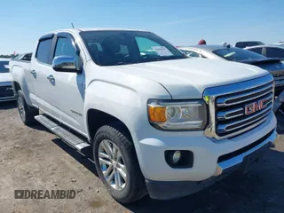 2015 GMC Canyon 2WD SLT with VIN 1GTG5CE36F1151433, listed as a IAAI auction lot 41636107 with 117,682 mi miles. Bid and sale history available at carsss.com. Image 1.
