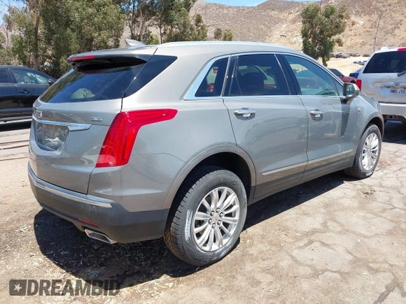2018 Cadillac XT5 FWD with VIN 1GYKNARS5JZ242794, listed as a IAAI auction lot 42813475 with 32,266 mi miles and . Bid and sale history available at DreamBid. Image 4.