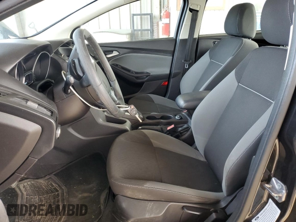 2013 Ford Focus SE z VIN 1FADP3F26DL106275, wystawiony jako Copart lot #55701345 z przebiegiem 117 897 mil mil oraz Szkody całkowita. Historia ofert i sprzedaży dostępna na DreamBid. Obrazek 7.