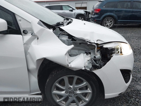 2015 Mazda Mazda5 Grand Touring with VIN JM1CW2DL6F0185594, listed as a IAAI auction lot 41470568 with 116,309 mi miles. Bid and sale history available at carsss.com. Image 6.