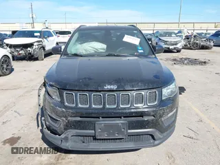 2018 Jeep Compass Sport with VIN 3C4NJCABXJT214907, listed as a IAAI auction lot 41814215 with 96,111 mi miles and . Bid and sale history available at DreamBid. Image 12.