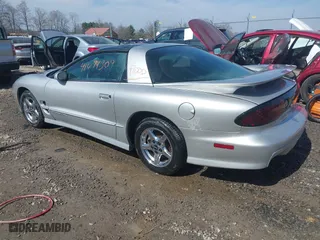 2000 Pontiac Firebird Formula with VIN 2G2FV22G5Y2161203, listed as a IAAI auction lot 41694309 with 1 mi miles. Bid and sale history available at carsss.com. Image 3.