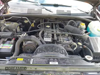 1997 Jeep Grand Cherokee Laredo with VIN 1J4GZ58S4VC702040, listed as a IAAI auction lot 42165536 with 121,803 mi miles and . Bid and sale history available at DreamBid. Image 10.