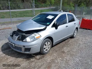 2010 Nissan Versa 1.6 with VIN 3N1CC1AP2AL417066, listed as a IAAI auction lot 41992823 with 251,038 mi miles. Bid and sale history available at carsss.com. Image 2.
