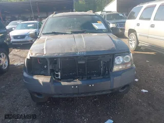 2004 Jeep Grand Cherokee Laredo with VIN 1J4GX48S44C394429, listed as a IAAI auction lot 41802203 with 144,925 mi miles. Bid and sale history available at carsss.com. Image 6.
