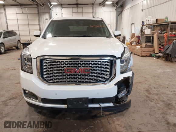 2015 GMC Yukon SLE with VIN 1GKS2AKC6FR103447, listed as a IAAI auction lot 41596220 with 104,209 mi miles. Bid and sale history available at carsss.com. Image 12.