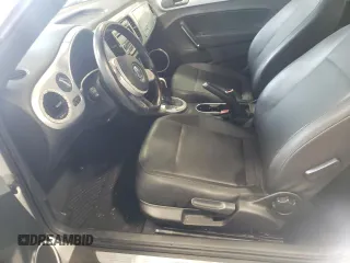 2012 Volkswagen Beetle 2.5L PZEV with VIN 3VWJP7AT8CM603469, listed as a Copart auction lot 56371425 with 97,575 mi miles and Clean title. Bid and sale history available at DreamBid. Image 7.