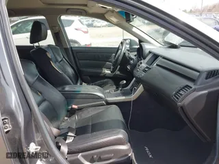 2012 Acura RDX with VIN 5J8TB1H21CA001175, listed as a IAAI auction lot 42038674 with 218,947 mi miles. Bid and sale history available at carsss.com. Image 5.