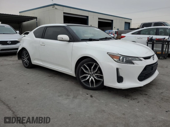 2014 Scion tC z VIN JTKJF5C7XE3079538, wystawiony jako Copart lot #85018414 z przebiegiem 136 905 mil mil oraz Czysty tytuł • Clean title. Historia ofert i sprzedaży dostępna na DreamBid. Obrazek 4.