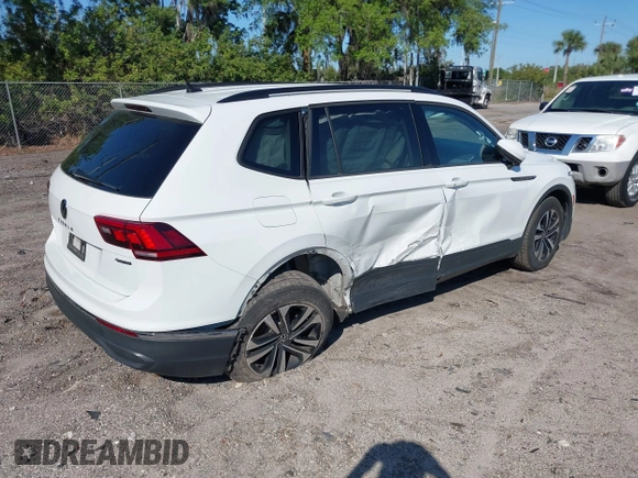 2022 Volkswagen Tiguan S with VIN 3VV0B7AX1NM099058, listed as a IAAI auction lot 41771674 with 49,789 mi miles. Bid and sale history available at carsss.com. Image 4.