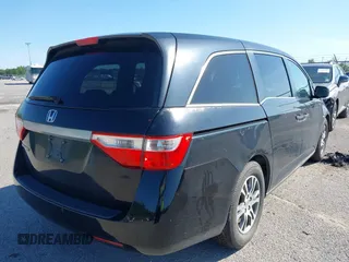 2011 Honda Odyssey EX-L with VIN 5FNRL5H66BB058333, listed as a IAAI auction lot 42172045 with 215,723 mi miles and . Bid and sale history available at carsss.com. Image 4.