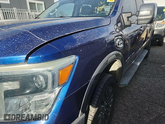 2016 Nissan Titan Platinum Reserve z VIN 1N6BA1F47GN502505, wystawiony jako IAAI lot #42520972 z przebiegiem 104 949 mil mil oraz . Historia ofert i sprzedaży dostępna na DreamBid. Obrazek 10.