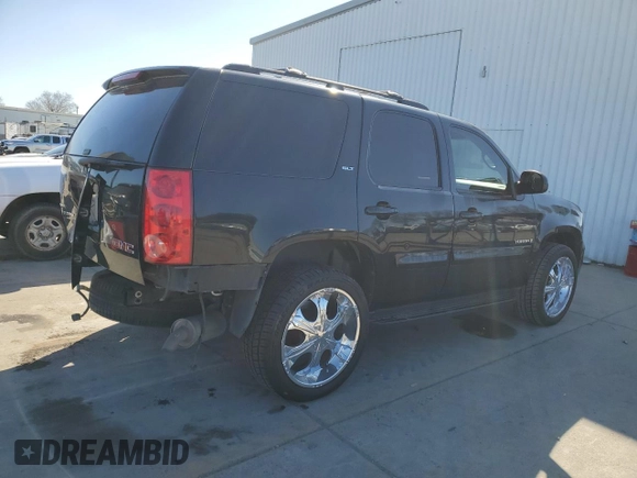 2009 GMC Yukon SLT w/4SB with VIN 1GKFK33059R106202, listed as a Copart auction lot 46700985 with 156,709 mi miles and Salvage Title. Bid and sale history available at carsss.com. Image 3.