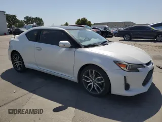 2015 Scion tC with VIN JTKJF5C7XF3092825, listed as a Copart auction lot 54870395 with 130,963 mi miles and Clean Title. Bid and sale history available at carsss.com. Image 4.