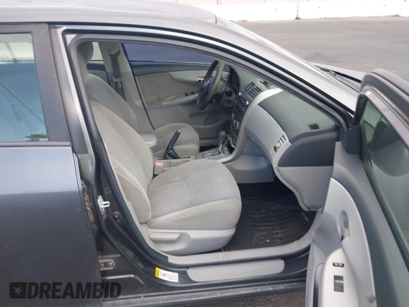 2011 Toyota Corolla L with VIN 2T1BU4EE9BC548192, listed as a IAAI auction lot 42036004 with 111,131 mi miles. Bid and sale history available at carsss.com. Image 5.