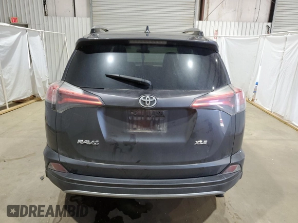2018 Toyota RAV4 XLE with VIN 2T3WFREV3JW423623, listed as a Copart auction lot 47364675 with 132,510 mi miles and Salvage Title. Bid and sale history available at DreamBid. Image 6.