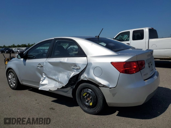 2010 Kia Forte EX z VIN KNAFU4A24A5054277, wystawiony jako Copart lot #56007995 z przebiegiem 218 782 mil mil oraz Szkody całkowita. Historia ofert i sprzedaży dostępna na DreamBid. Obrazek 2.