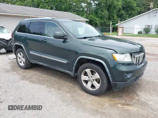 2011 Jeep Grand Cherokee Laredo z VIN 1J4RR4GG1BC542534, wystawiony jako IAAI lot #42505120 z przebiegiem 221 903 mil mil oraz . Historia ofert i sprzedaży dostępna na DreamBid. Obrazek 1.