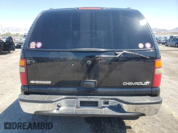 2003 Chevrolet Tahoe LS с VIN 1GNEC13V43R292866, выставлен на аукционе Copart как лот 60574355 с пробегом 250 872 миль миль и Списание • Salvage title. История ставок и продаж доступна на DreamBid. Изображение 6.