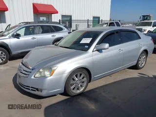2007 Toyota Avalon XL with VIN 4T1BK36B97U179702, listed as a IAAI auction lot 41803073 with 162,376 mi miles. Bid and sale history available at carsss.com. Image 2.