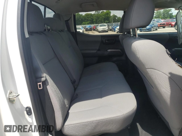 2018 Toyota Tacoma SR5 z VIN 3TMAZ5CN0JM056596, wystawiony jako Copart lot #58373385 z przebiegiem 60 798 mil mil oraz Szkoda całkowita • Salvage title. Historia ofert i sprzedaży dostępna na DreamBid. Obrazek 10.