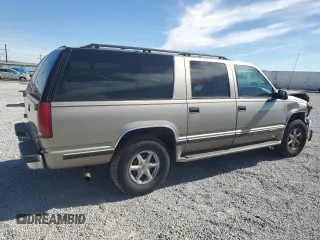 1999 Chevrolet Suburban with VIN 1GNFK16R6XJ492206, listed as a Copart auction lot 71728594 with 129,871 mi miles and Salvage Title. Bid and sale history available at carsss.com. Image 3.