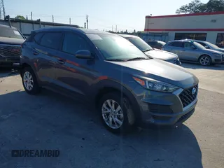2019 Hyundai Tucson Value z VIN KM8J33A43KU060487, wystawiony jako IAAI lot #41488389 z przebiegiem 192 358 mil mil oraz . Historia ofert i sprzedaży dostępna na DreamBid. Obrazek 1.