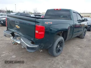 2015 Chevrolet Silverado 1500 LT with VIN 1GCVKREC1FZ342326, listed as a IAAI auction lot 41968095 with 119,911 mi miles and . Bid and sale history available at DreamBid. Image 4.