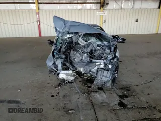 2022 Honda Civic Sport z VIN 2HGFE2F52NH509652, wystawiony jako Copart lot #54934335 z przebiegiem Nie podano mil oraz Szkoda całkowita • Salvage title. Historia ofert i sprzedaży dostępna na DreamBid. Obrazek 13.