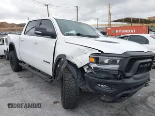 2021 Ram 1500 Rebel with VIN 1C6SRFLT1MN531442, listed as a IAAI auction lot 40969973 with 52,475 mi miles and . Bid and sale history available at DreamBid. Image 1.