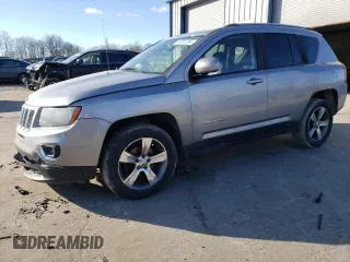 2016 Jeep Compass Latitude with VIN 1C4NJDEB2GD697923, listed as a Copart auction lot 84081394 with 167,240 mi miles and Salvage Title. Bid and sale history available at carsss.com. Image 1.
